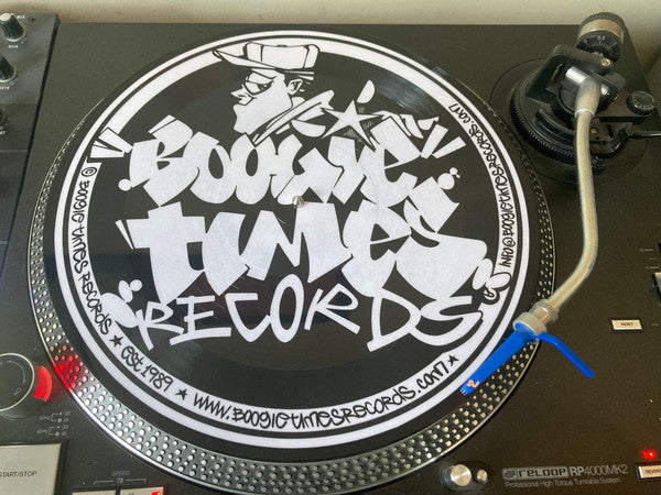 Timebase - Unity / Fireball picture disc on a turntable, track information side