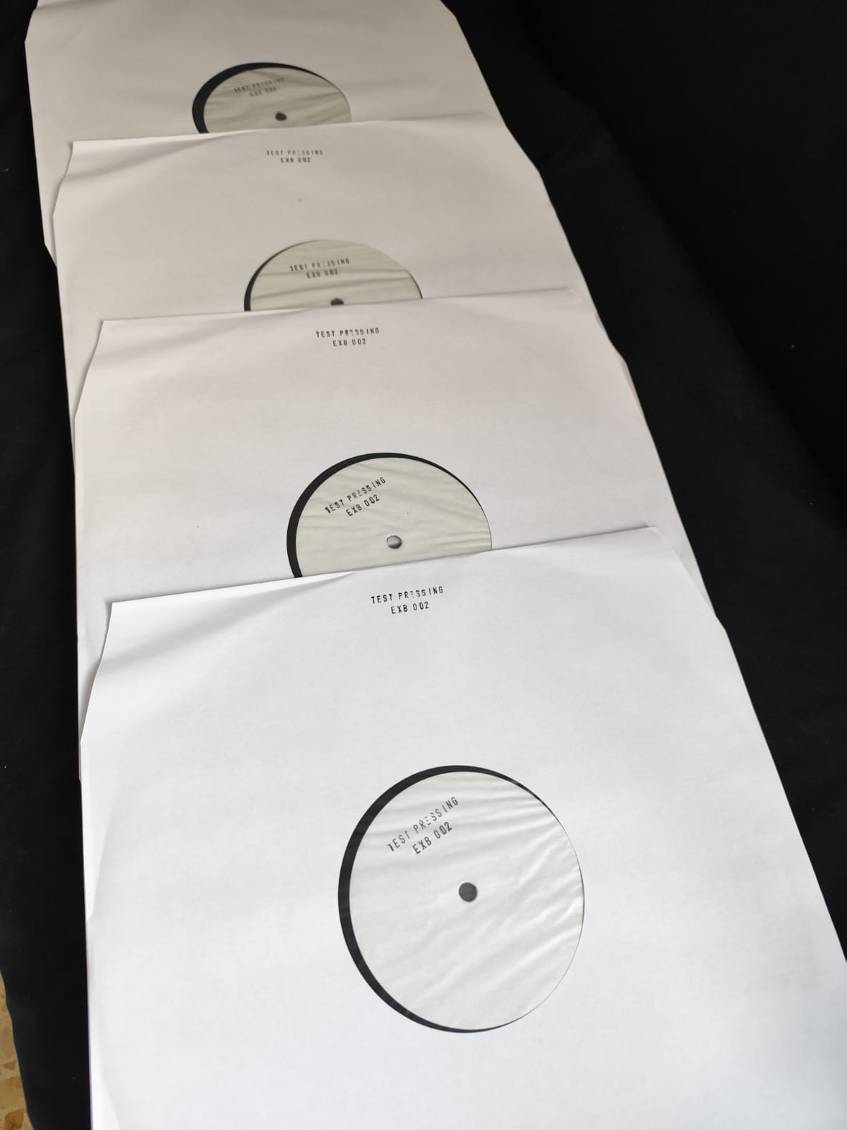Test Press EXB 002 – stack of 5 copies
